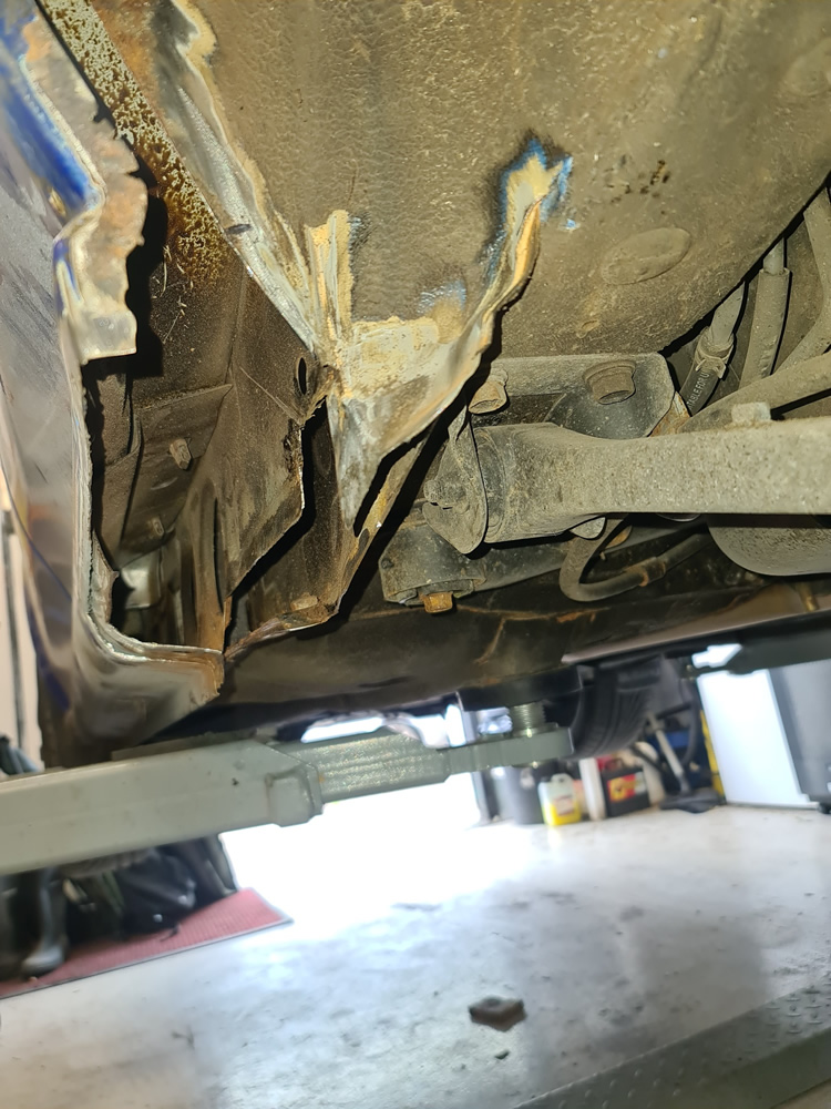Subaru Impreza Rust repair - old rusty metal removed