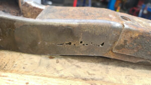 a picture of some more corrosion on one of the outriggers