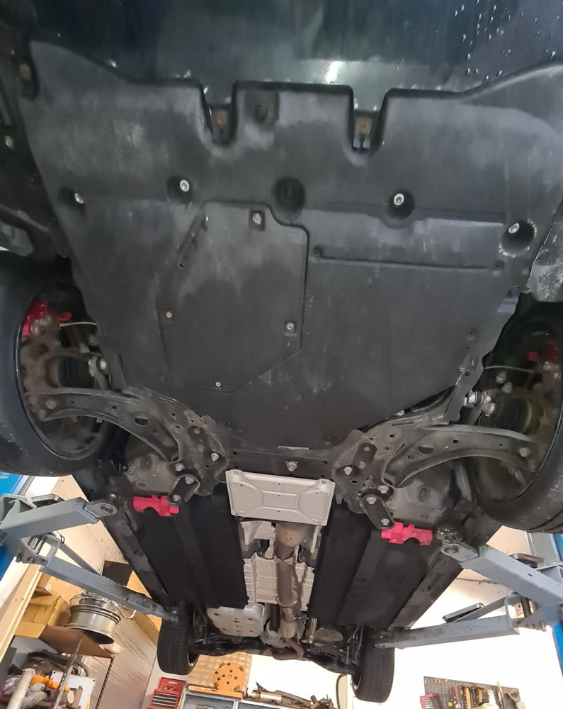 GR Yaris underbody showing all the covers we need to remove